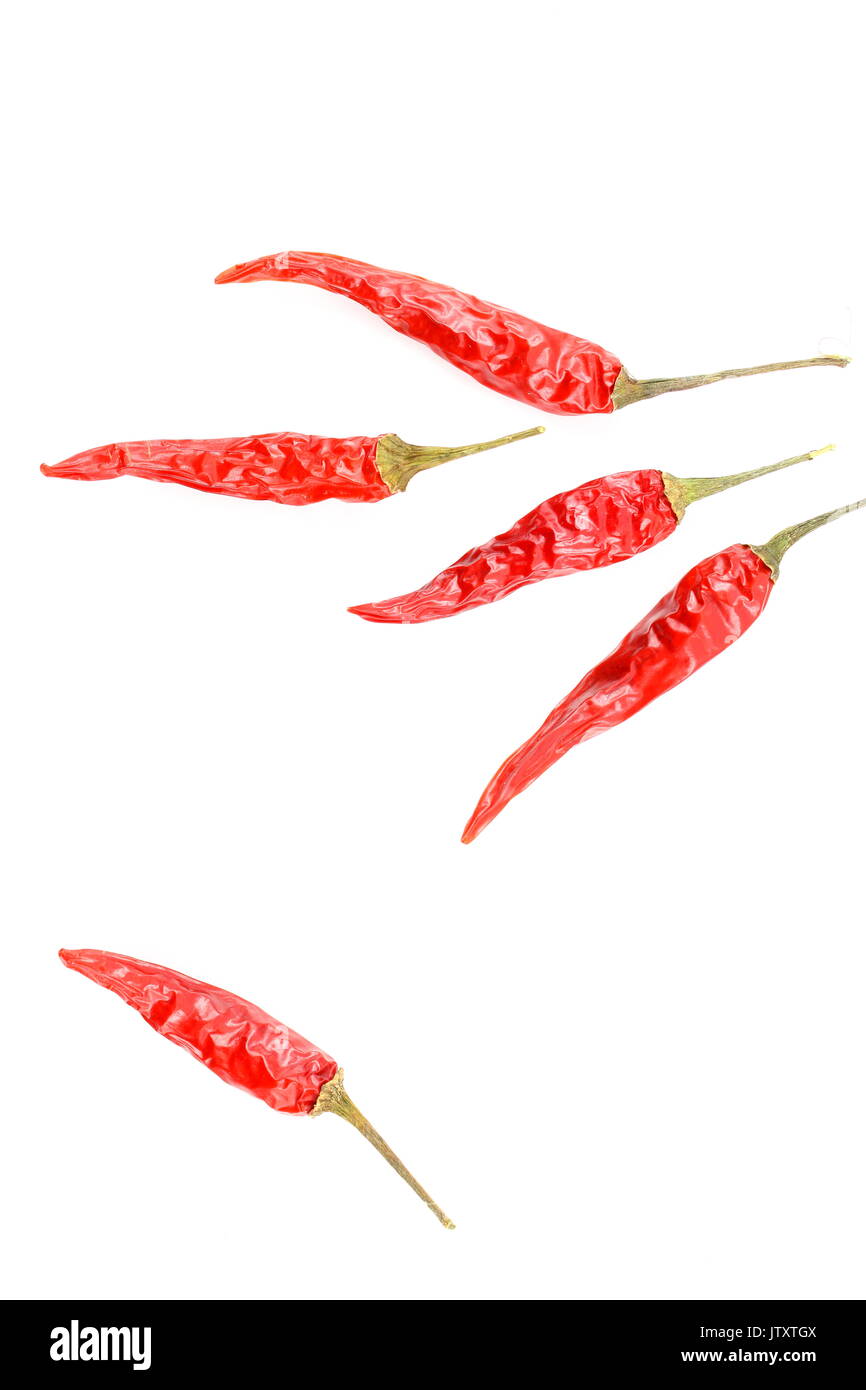 composition of dried thai chili peppers isolated on a white background