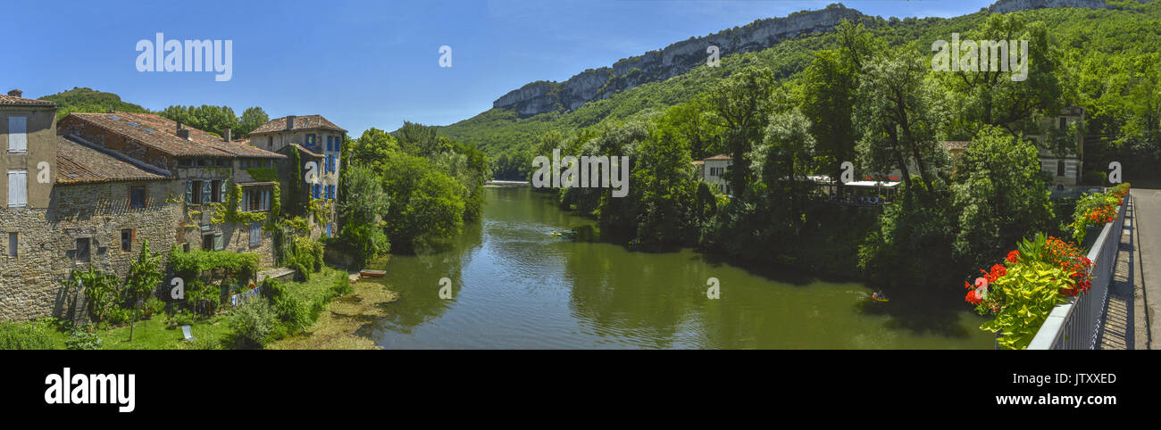 Panorama of the market town of St-Antonin-Noble-Val, in Occitanie, France. This view is from the bridge over the Aveyron river in Summer. Stock Photo