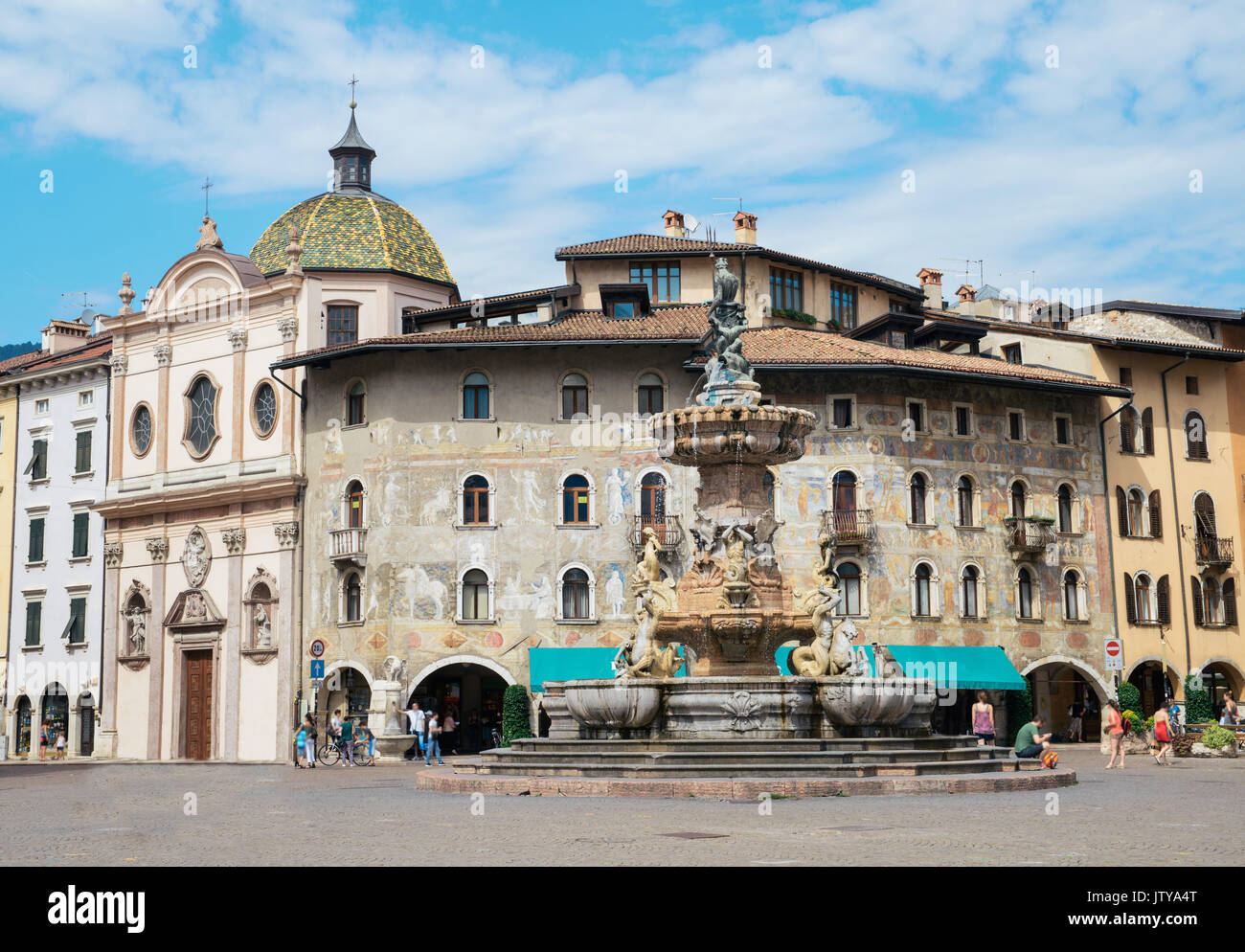 Fogolino frescoes on Case Cazuffi-Rella house and Fountain of Neptune at Piazza Duomo in the center of Trento, Italy Stock Photo