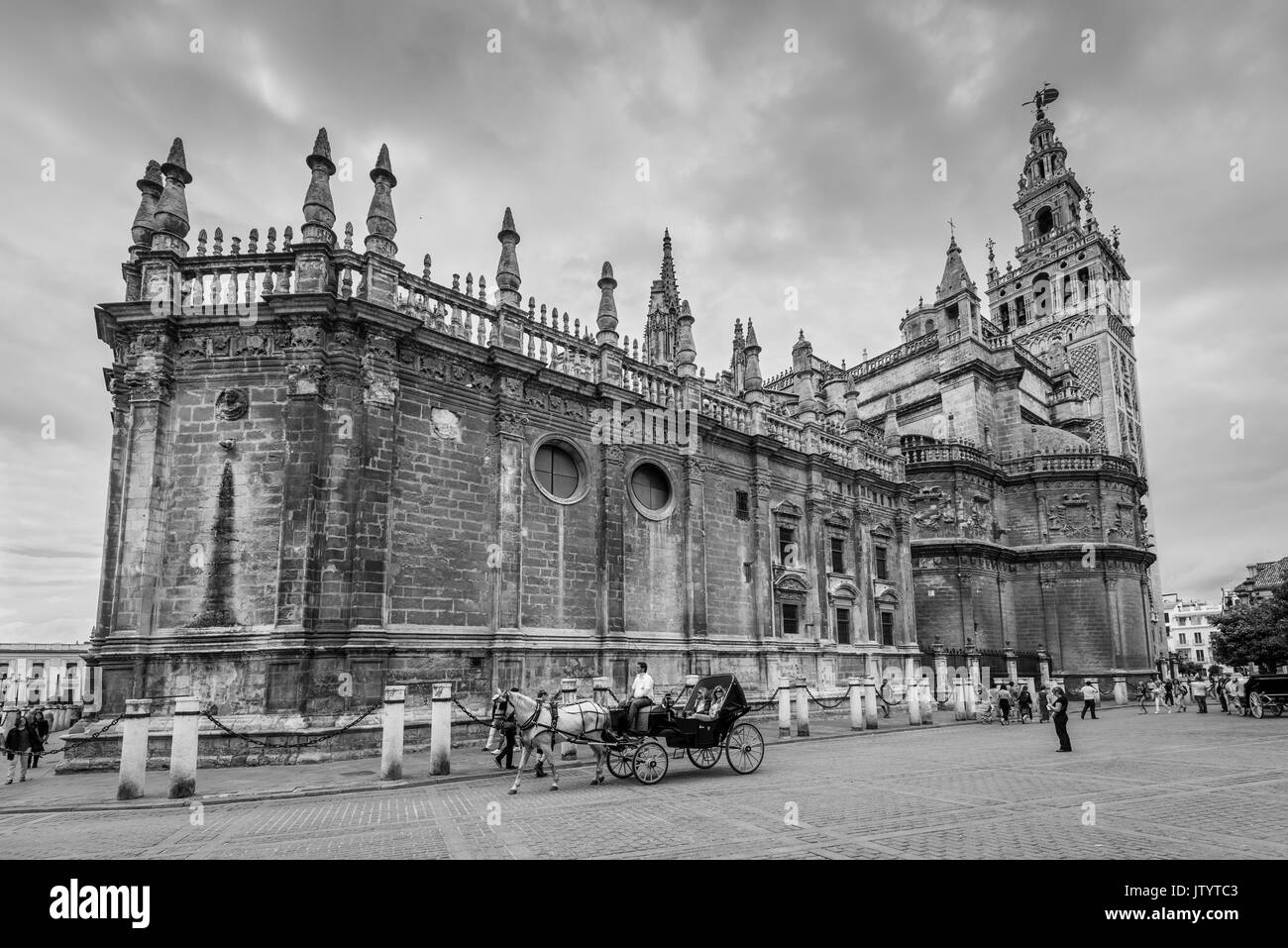 Seville, Spain - May 20, 2014: The Cathedral of Saint Mary of the See (Catedral de Santa Maria de la Sede), Gothic style architecture in Spain, Andalu Stock Photo