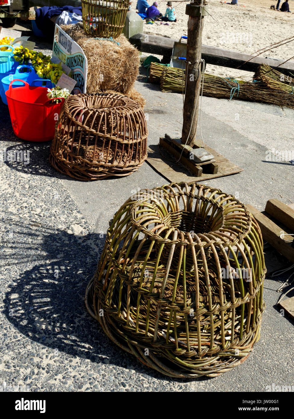 Traditional withy crab pots on the quayside at St Ives, Cornwall Stock