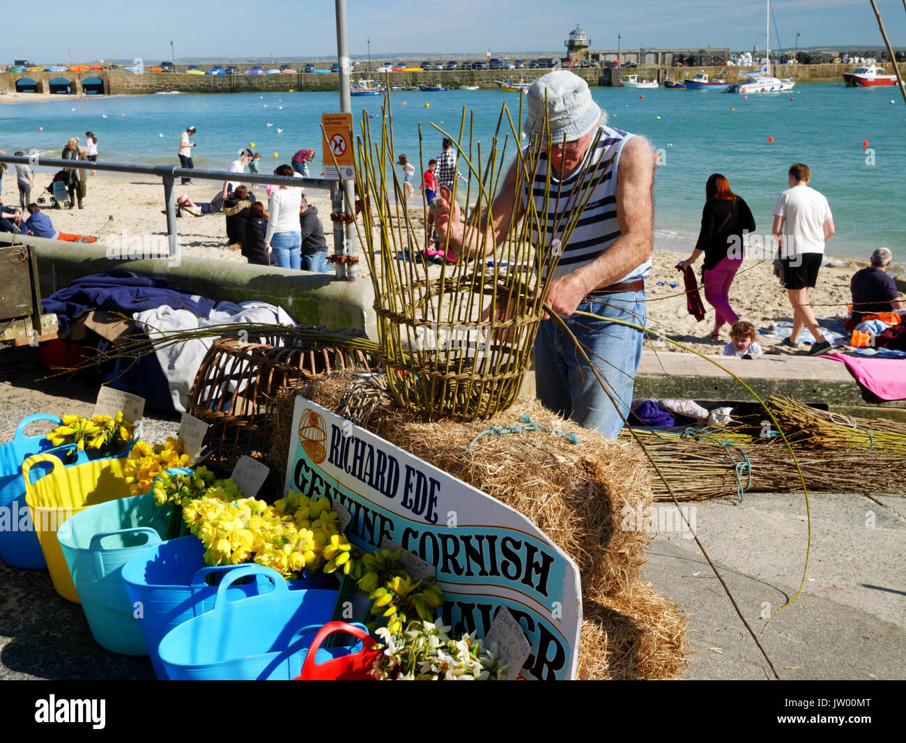 Cornish withy crab pot maker Richard Ede demonstrating his craft at St Ives, 25th March 2017. Stock Photo