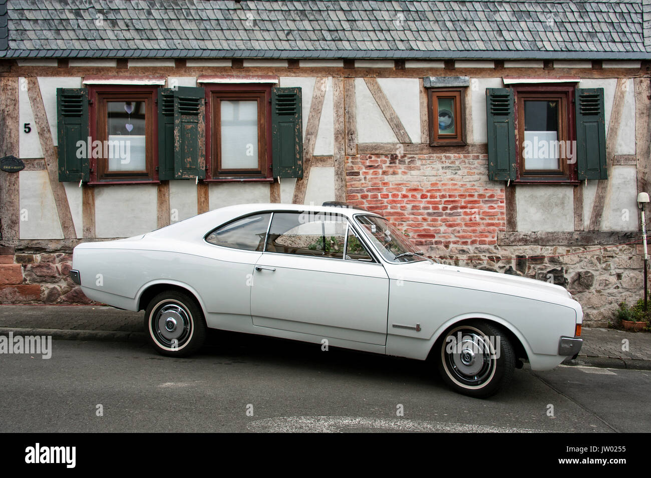 Vintage Car Festival 'Golden Oldies', Opel Rekord Coupe in front of a half-timbered house. Stock Photo