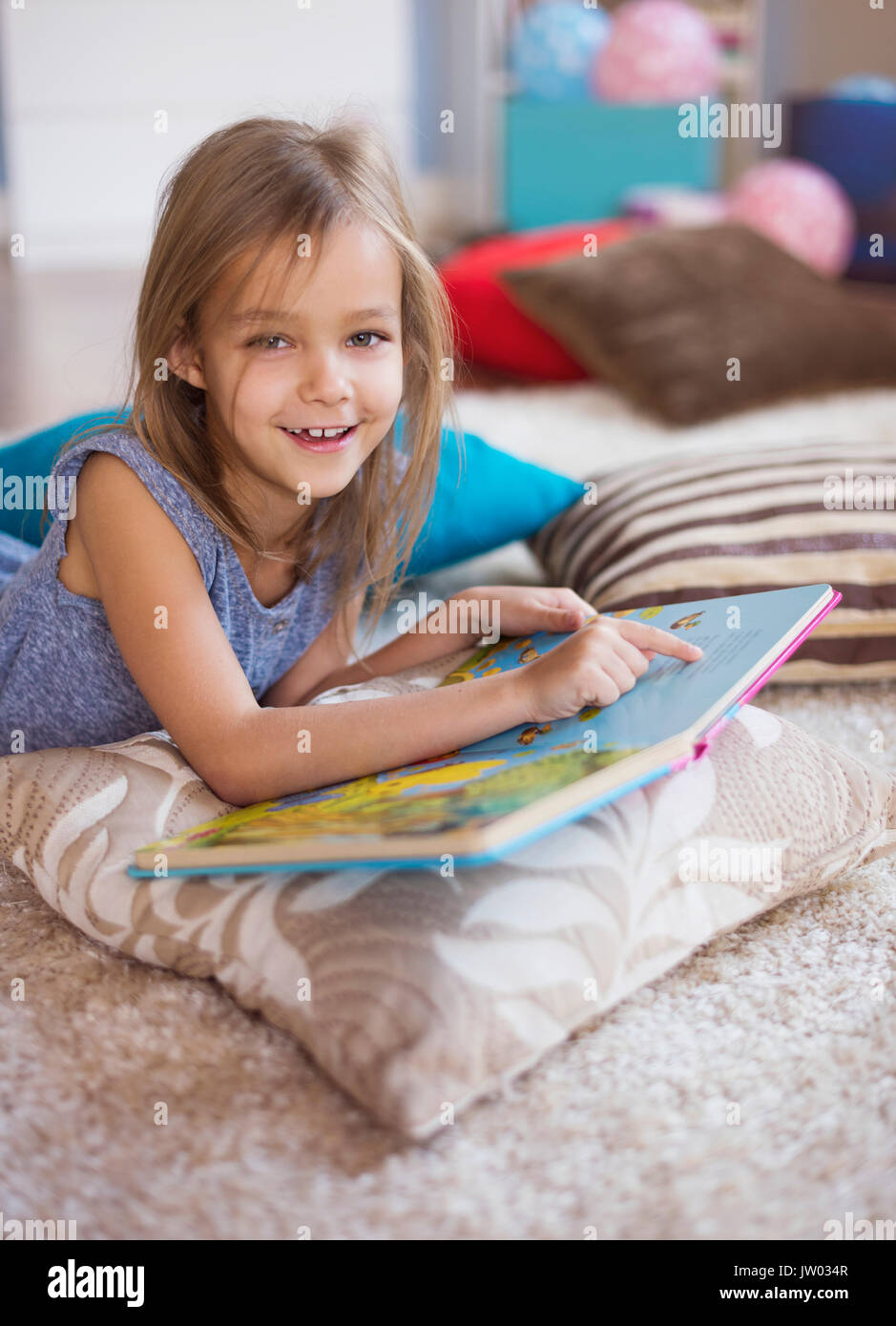 The most favourite book of little girl Stock Photo