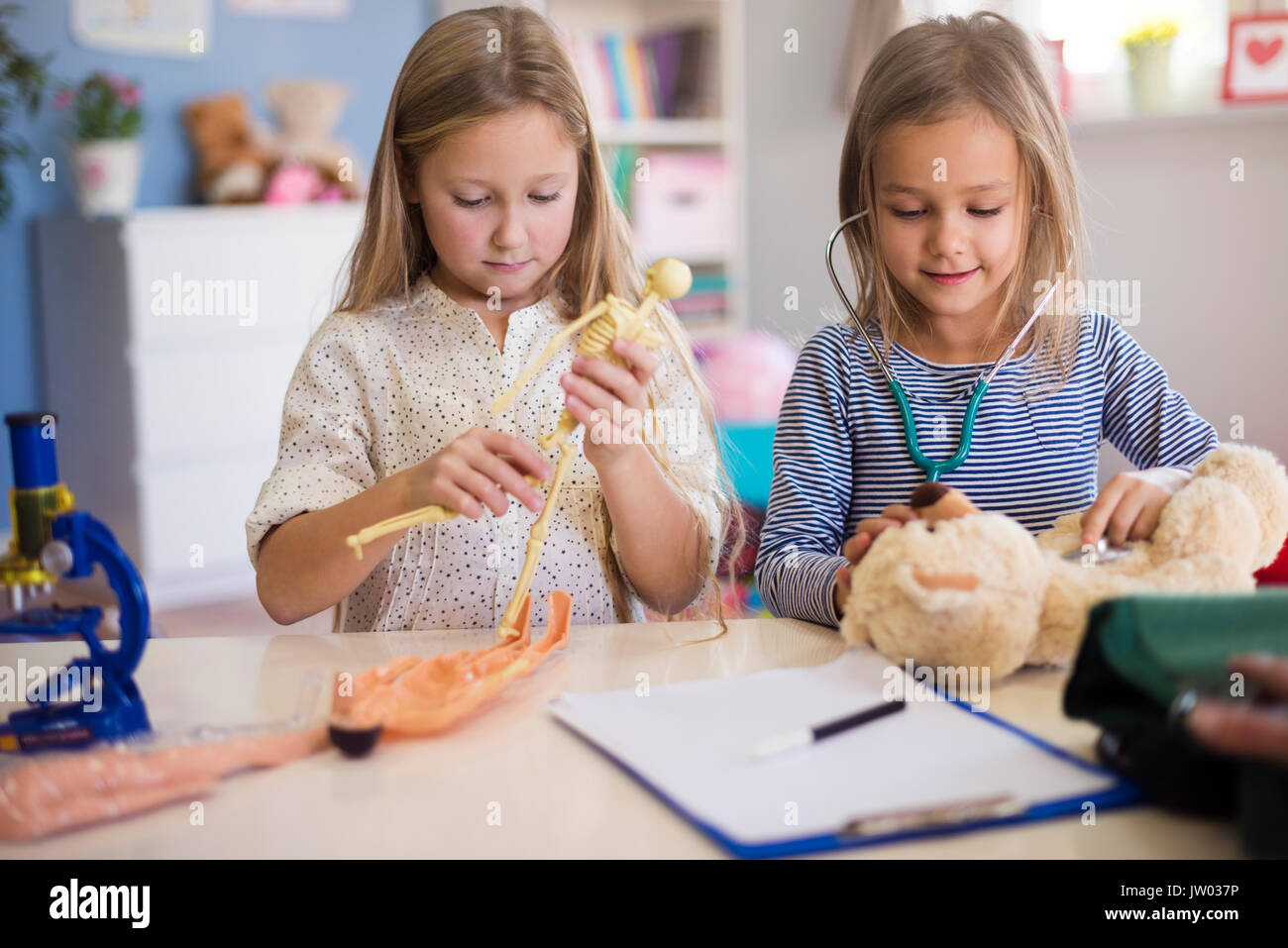Pretend to be a girl. Holding sign cute. Девочка в костюме доктора удивленная. Pretend to be a girl. Кукла сидит на полу.