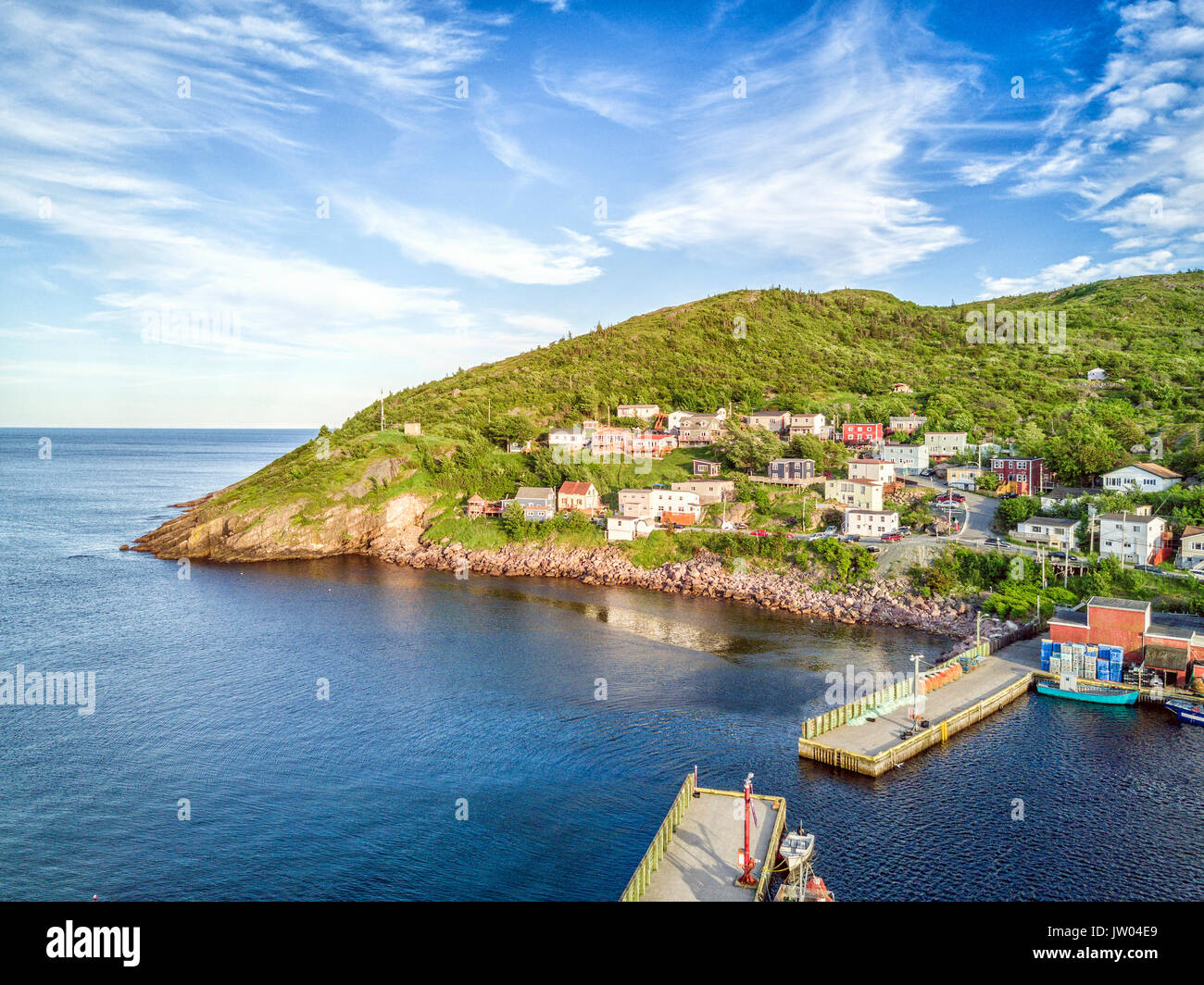 Beutiful Petty Harbour with two piers during summer sunset, Newfoundland and Labrador, Canada