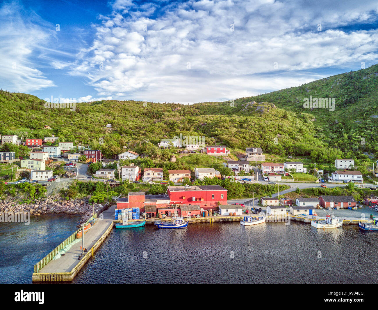 Beutiful Petty Harbour with two piers during summer sunset, Newfoundland and Labrador, Canada Stock Photo