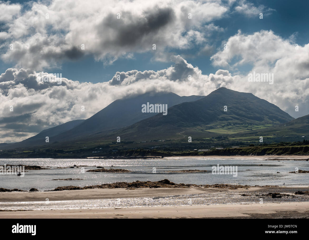 Croagh Patrick in clouds seen from Louisburgh small harbor in Ireland Stock Photo