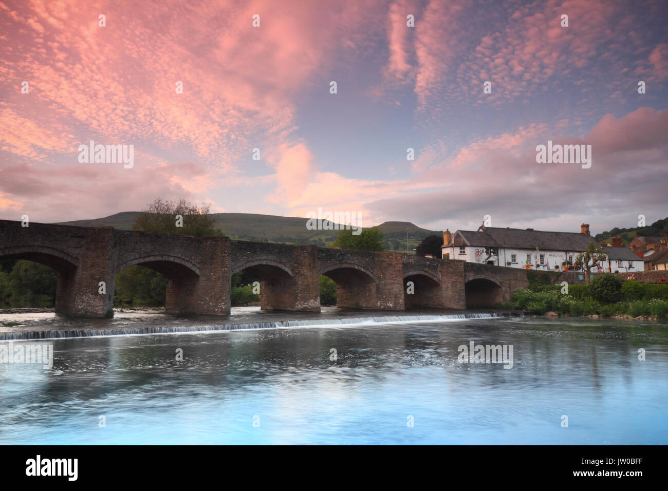 Crickhowell Bridge spanning the River Usk on the edge of historic Crickhowell town on a beautiful evening, Crickhowell, Powys, Wales, UK Stock Photo