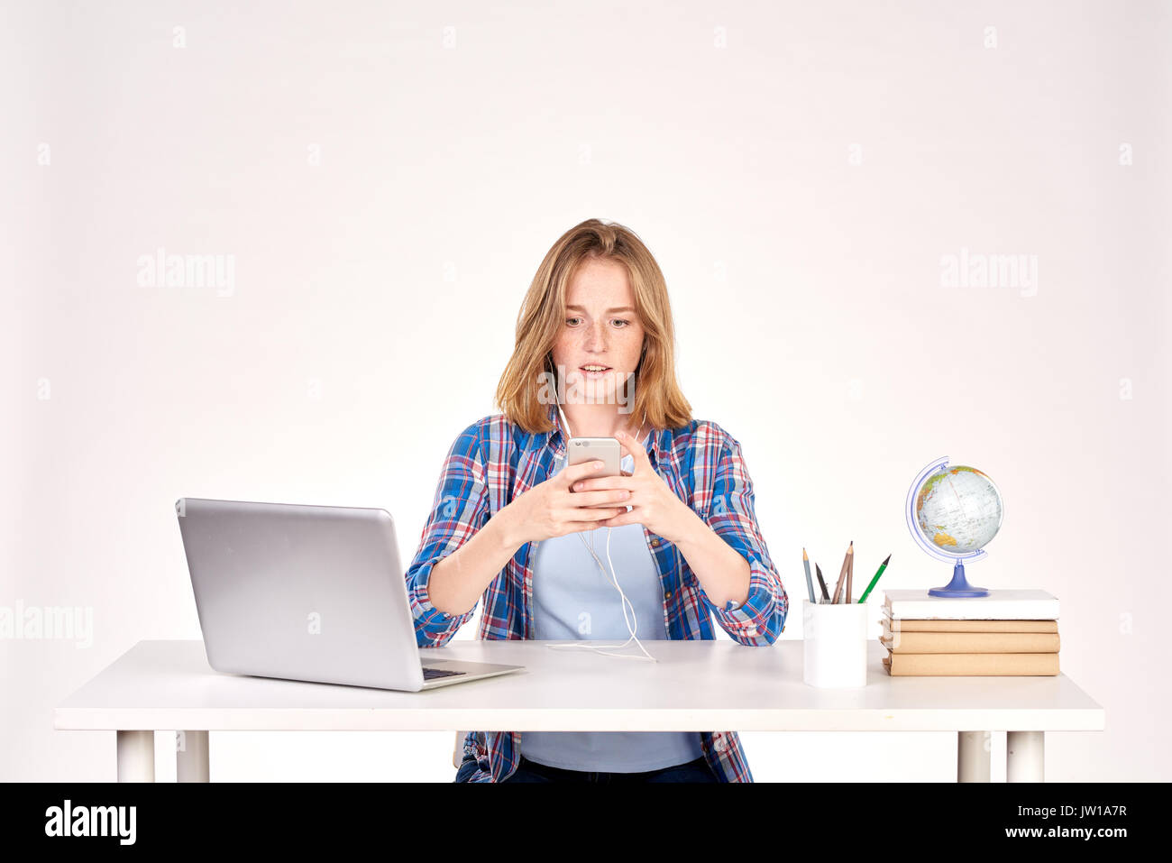 Teenage student at desk Stock Photo Alamy