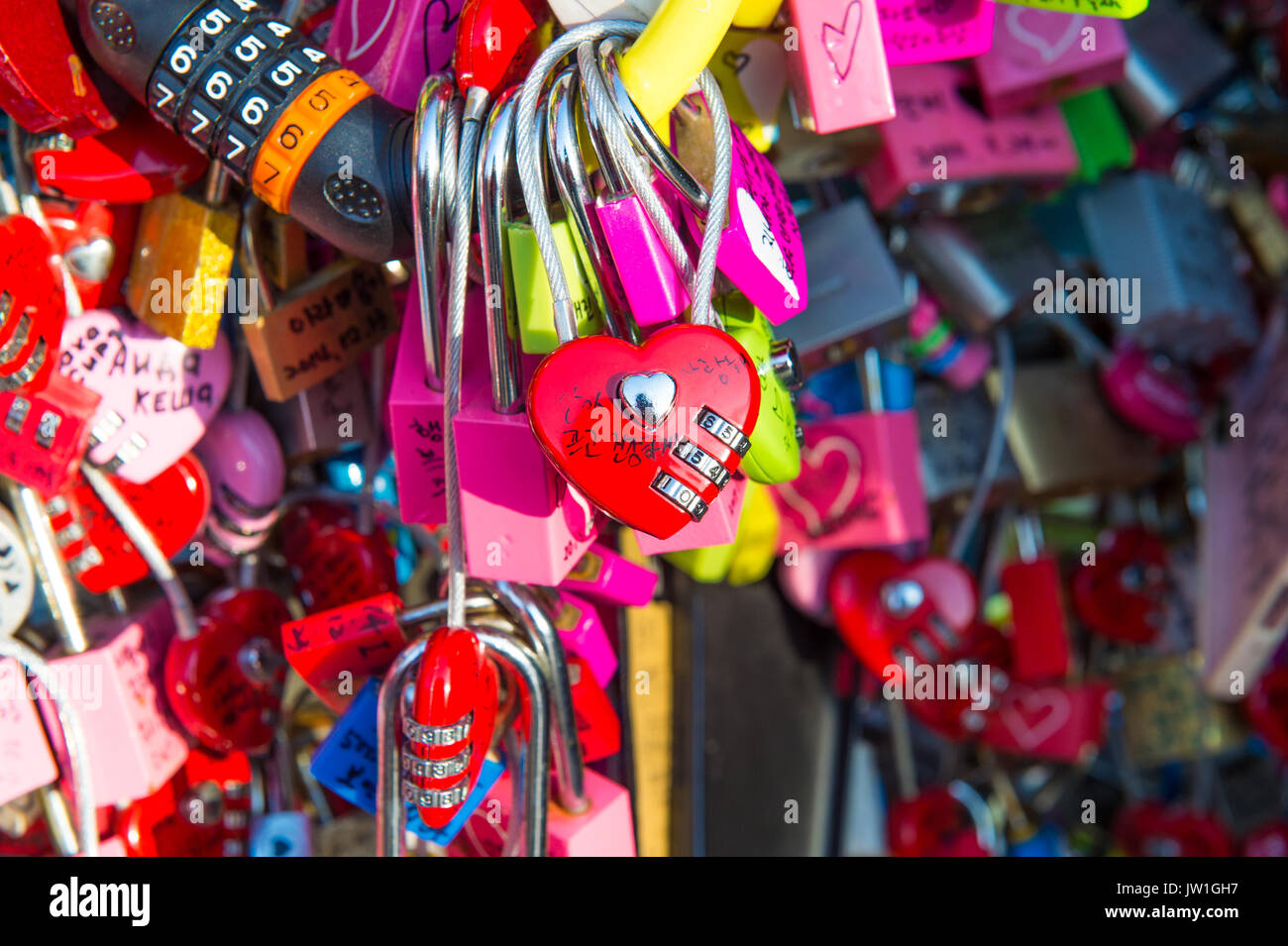 SEOUL - FEBRUARY 1 : Love padlocks at N Seoul Tower or Locks of love is a custom in some cultures which symbolize their love will be locked forever at Stock Photo
