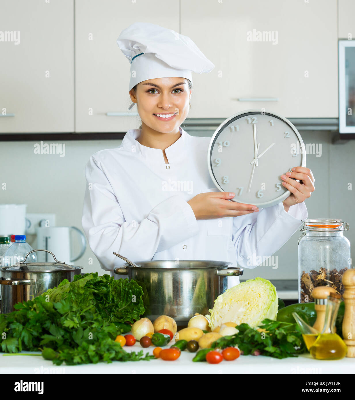 Chef clock portrait happy hi-res stock photography and images - Alamy