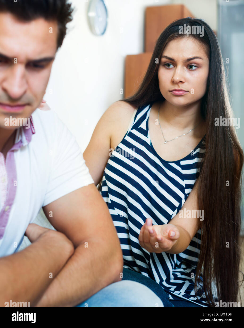 Angry young spouses having domestic argue at the living room Stock ...