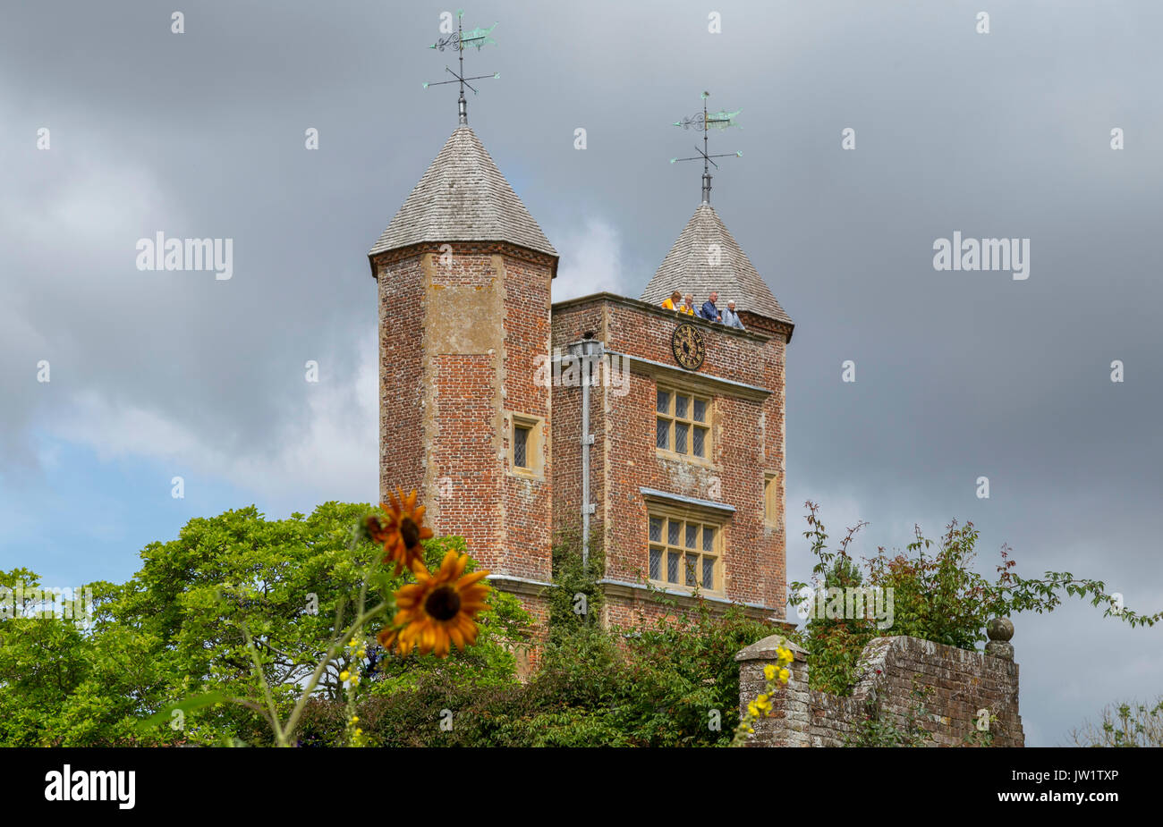 People enjoying the garden view from the Elizabethan tower of Sissinghurst Castle, Kent, England, United Kingdom. Stock Photo