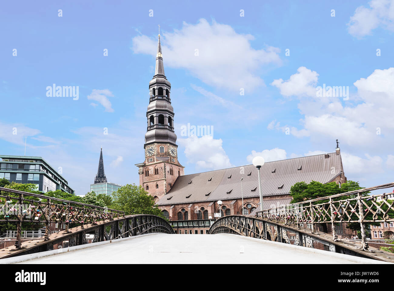 low angle shot of Sankt Katharinen church in Hamburg, Germany as seen from opposite side of Zollkanal channel Stock Photo
