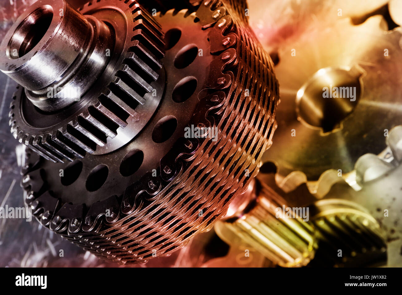 gears and cogs powered by large timing chain Stock Photo Alamy
