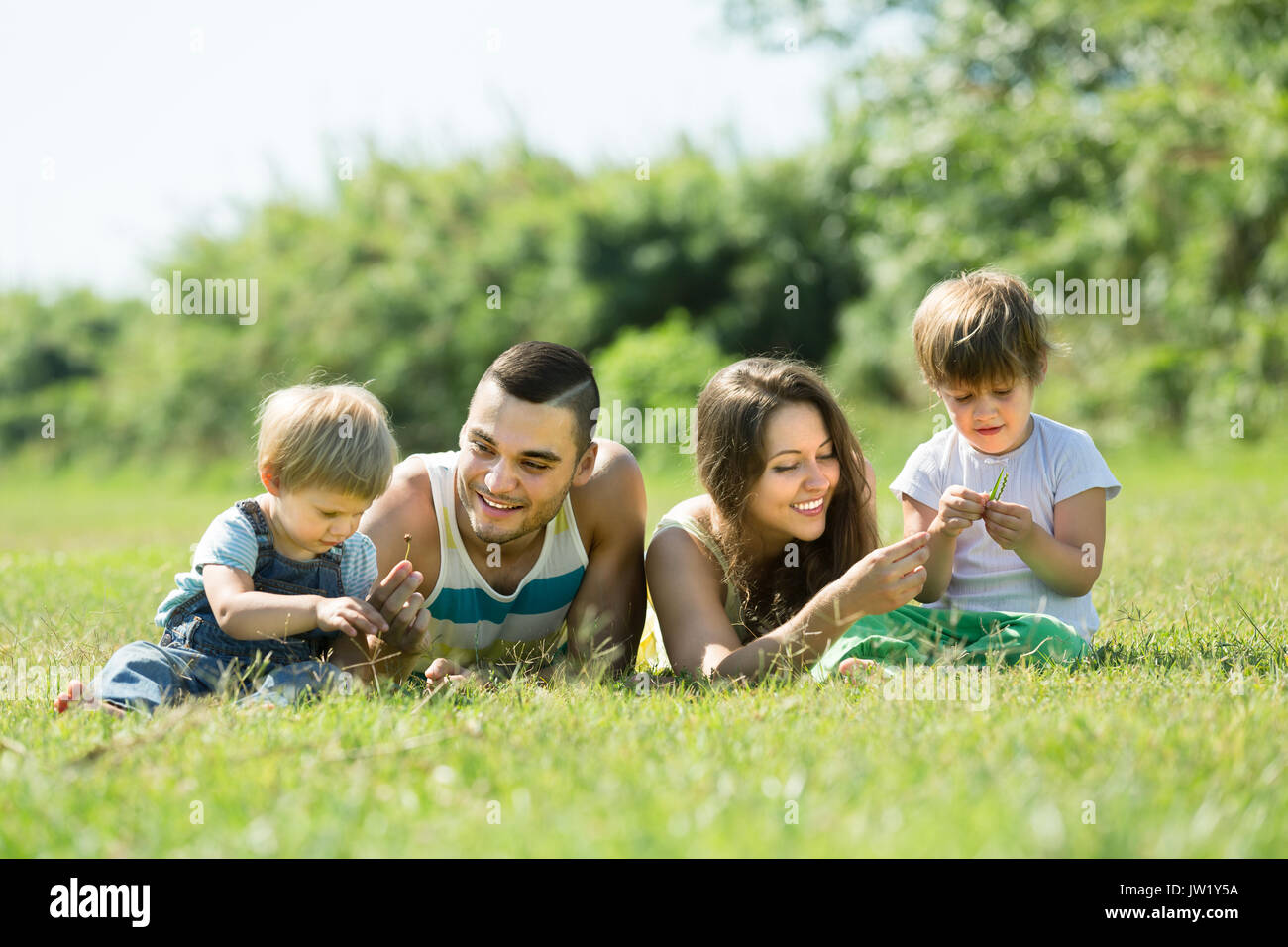 Two happy little asian kids playing outdoor in the sunny park Stock Photo -  Alamy