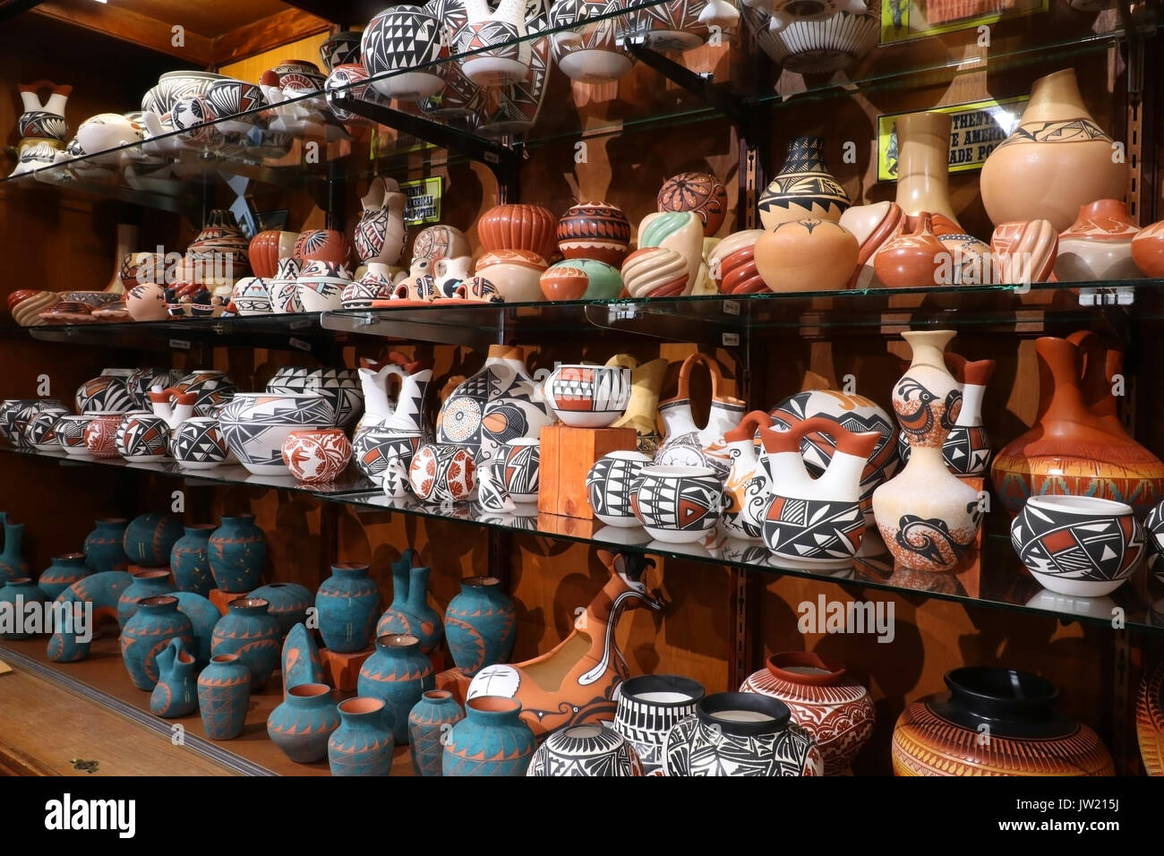 Shelves with hand made by native american navajo tribe souvenirs at historic trading post. Native american craft and culture background. Grand Canyon, Stock Photo