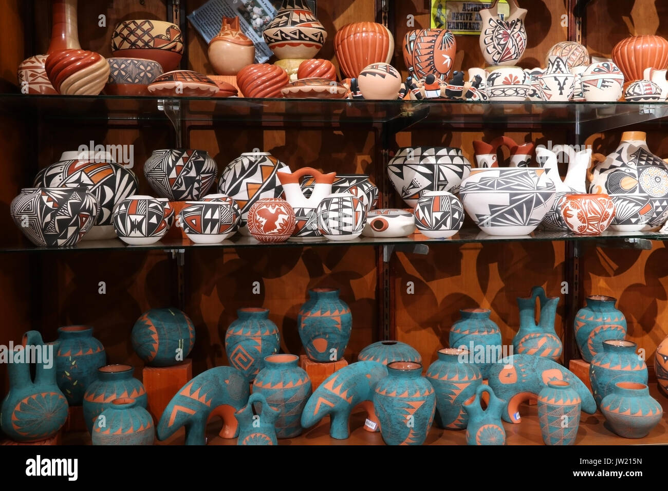 Shelves with hand made by native american navajo tribe souvenirs at historic trading post. Native american craft and culture background. Grand Canyon, Stock Photo