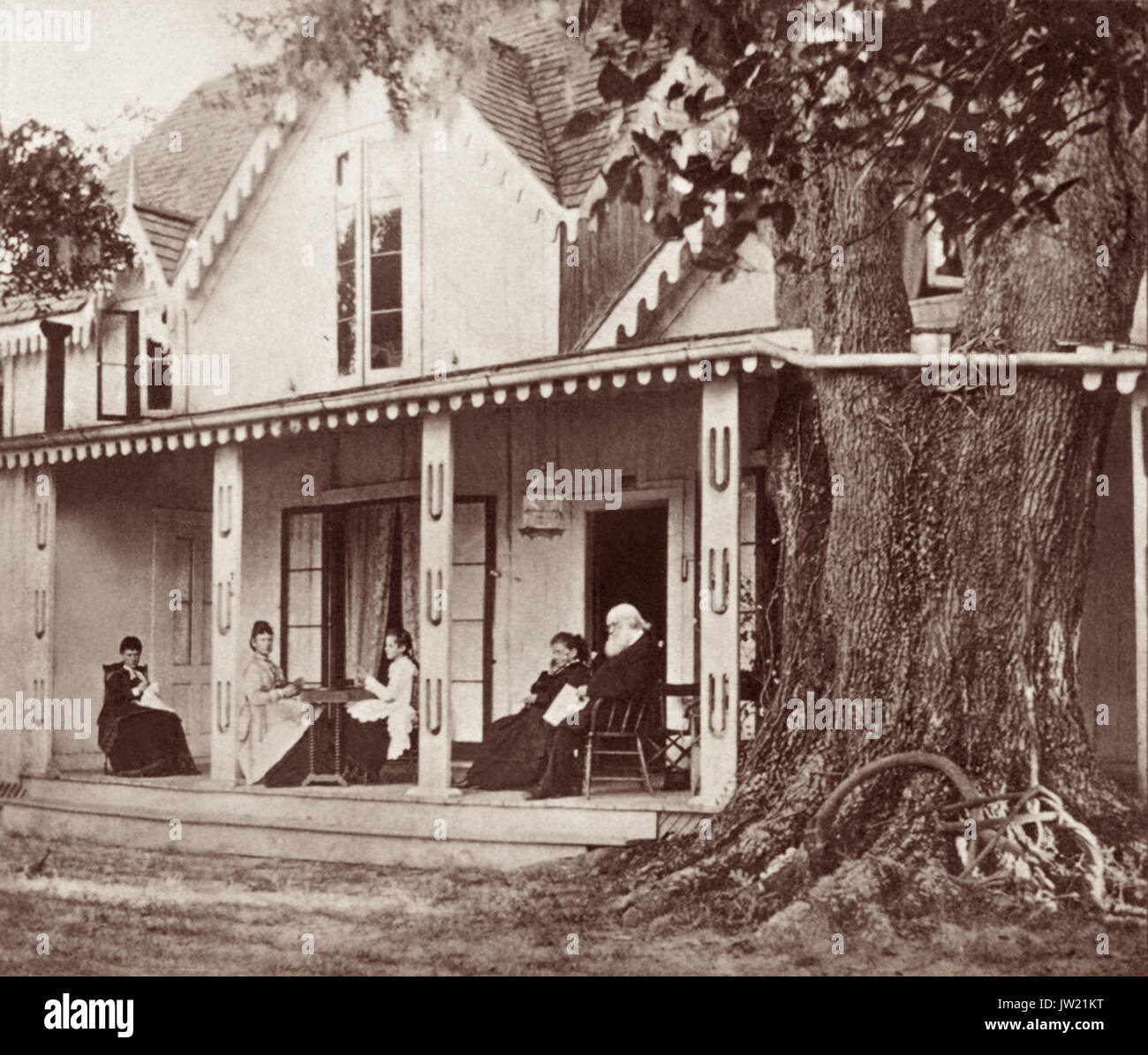 Harriet Beecher Stowe (1811-1896) and her husband Cyril Stowe, along with their daughters, on the porch of their post-Civil War winter home in Mandarin, Florida overlooking the St. Johns River. The Stowes were abolitionists and Mrs. Stowe was an author, best known for her novel Uncle Tom's Cabin. The Stowes wintered in Mandarin (now a Jacksonville neighborhood) between 1867 and 1884. Stories about Mandarin are compiled in the book Palmetto Leaves, written by Harriet. The Stowes would host Bible studies in their home where Cyril would teach, often on the porch pictured here. Stock Photo