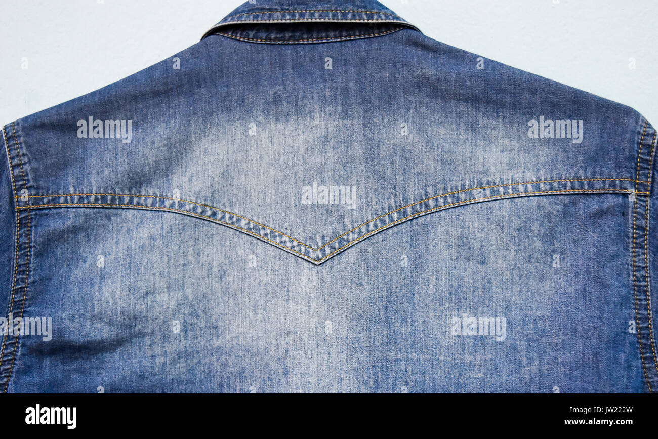 backside of denim shirt in blur,look smart and gentle. Stock Photo