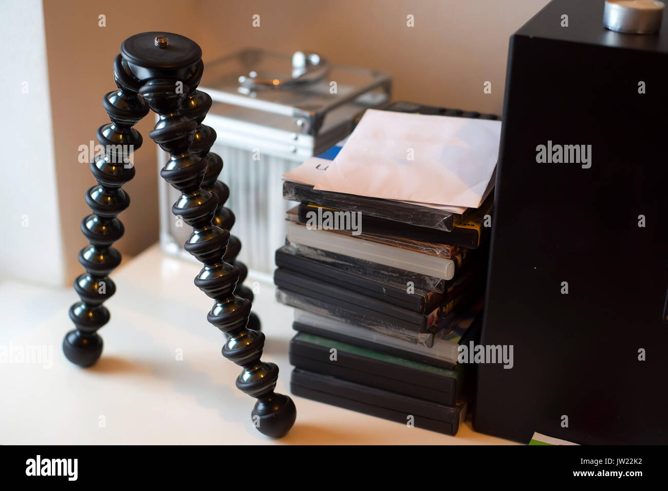 Mini tripod on table Stock Photo