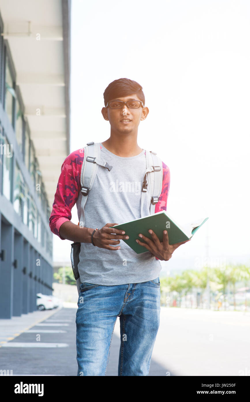 Profile of a Teenage Indian Boy Looking at outsides Stock Photo