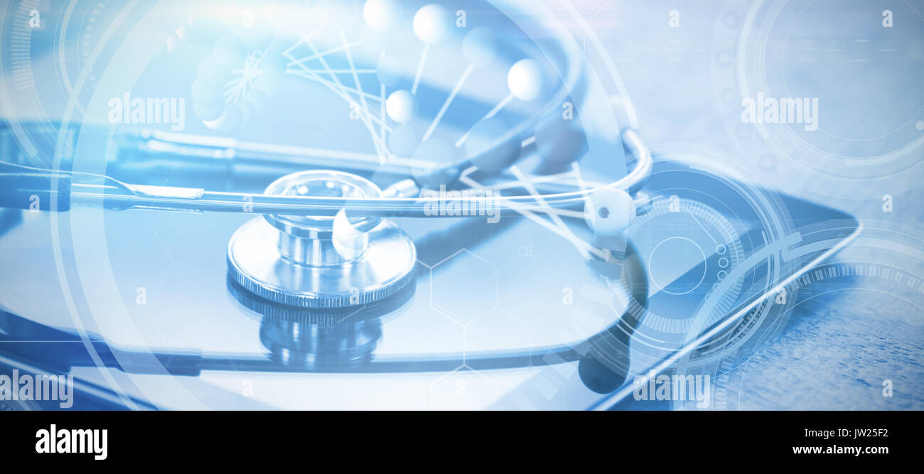 Image of molecules interface against stethoscope on digital tablet Stock Photo