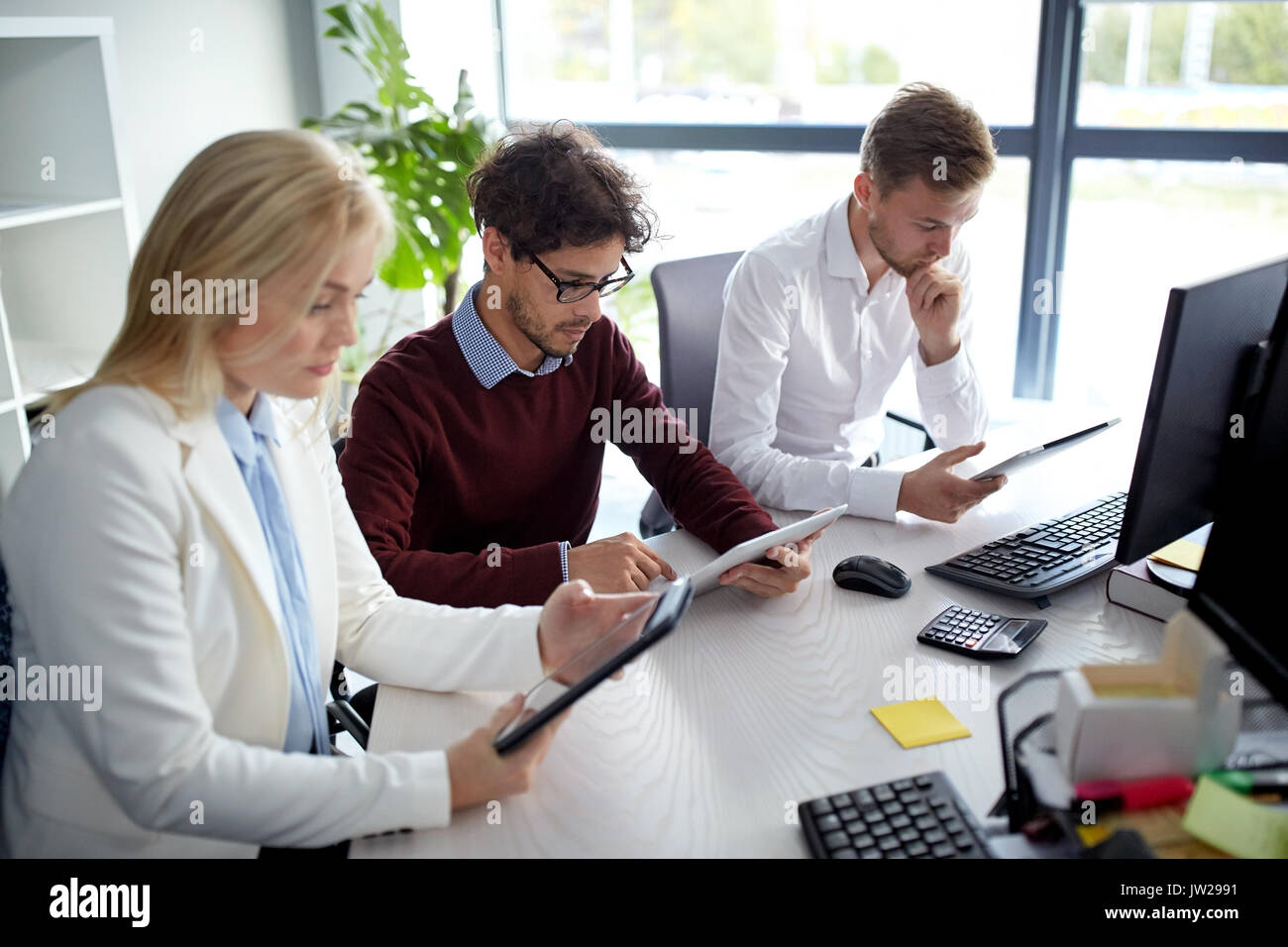business team with tablet pc at office Stock Photo