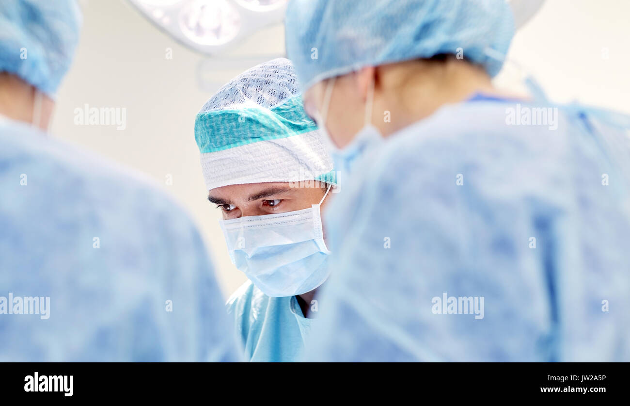 group of surgeons in operating room at hospital Stock Photo - Alamy