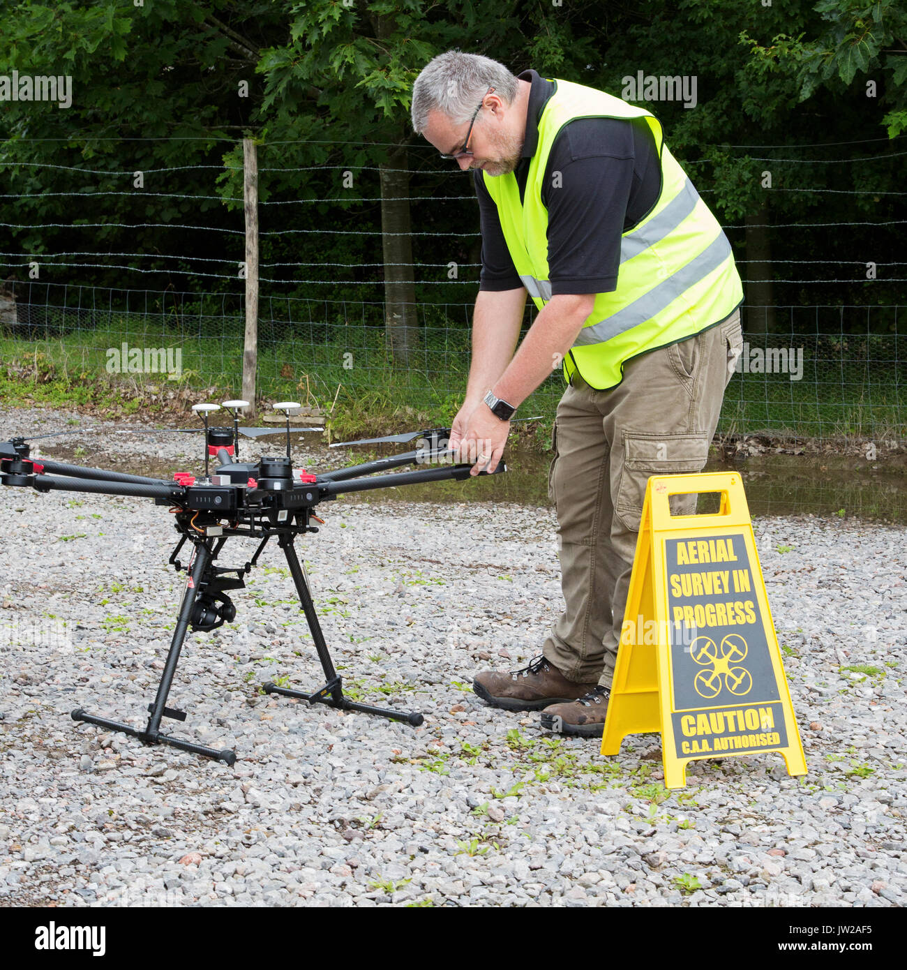 Drone Pilot Preparing and flying a drone / UAV Stock Photo Alamy