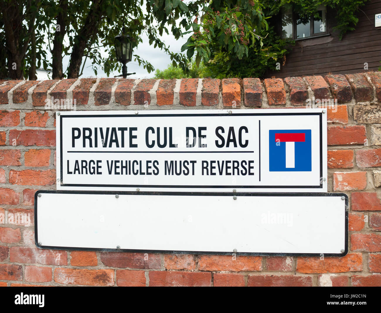 close up of private cul de sac sign on wall; UK Stock Photo