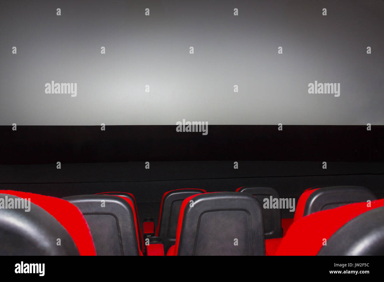 Empty movie theater with red seats Stock Photo