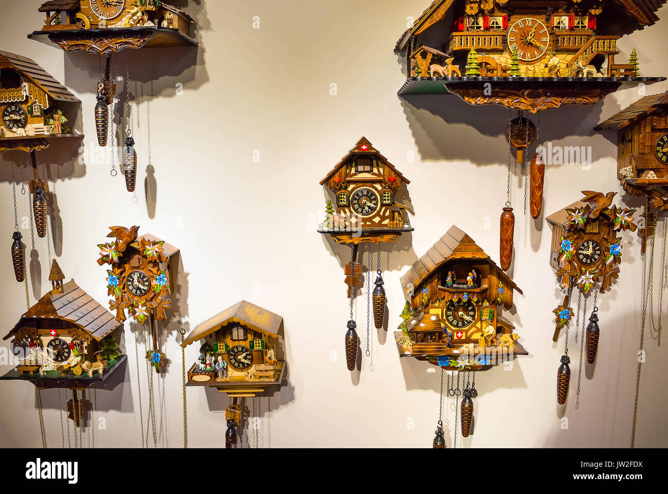 The lot of swiss wooden clocks Stock Photo Alamy