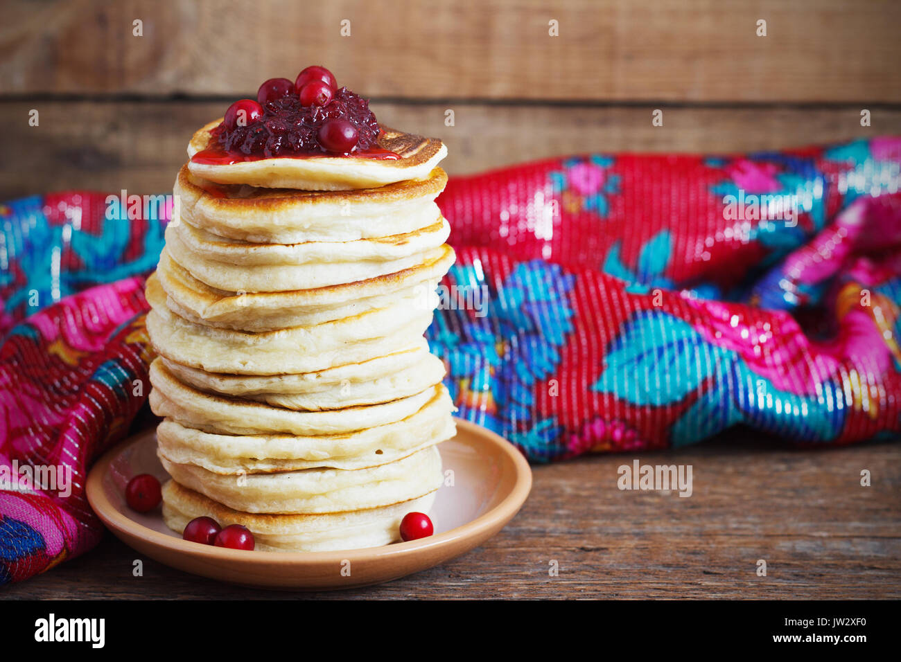 Staple of yeast pancakes from cranberry, traditional for Russian