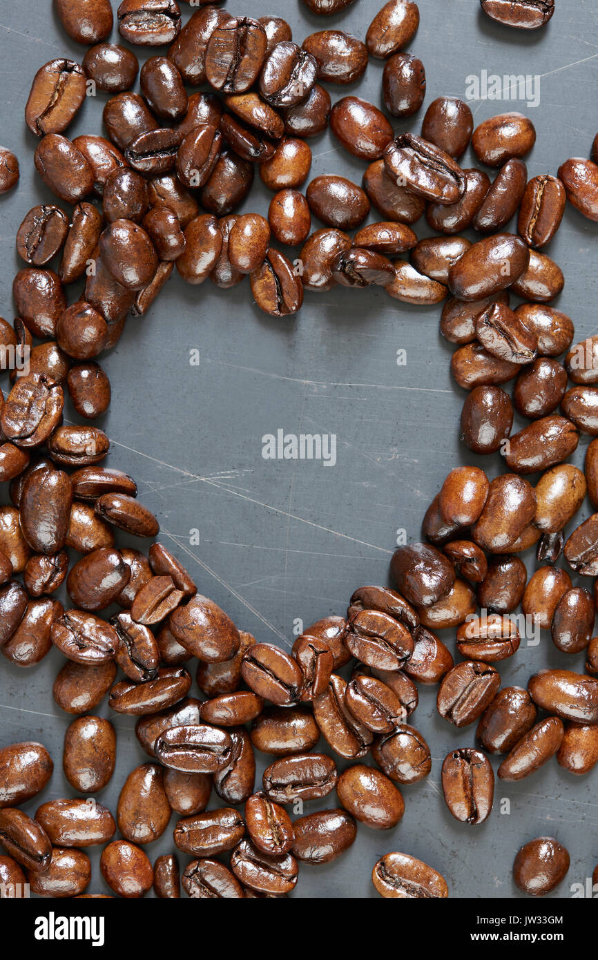 Heart shape made of roasted coffee beans Stock Photo