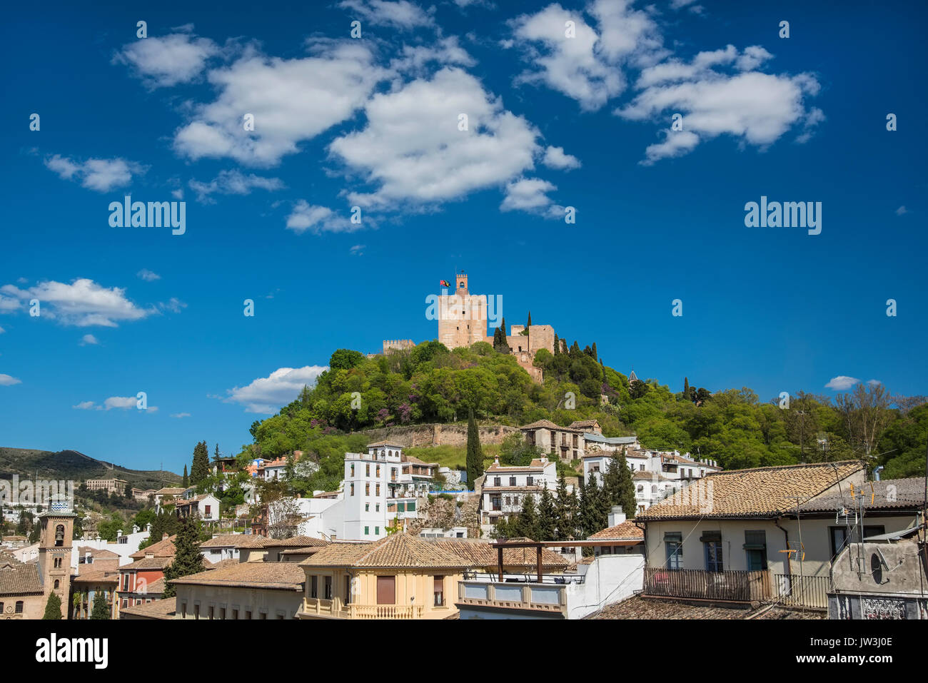 Spain, Andalusia, Granada, Plaza Nueva, Palace of Alhambra on hill Stock Photo