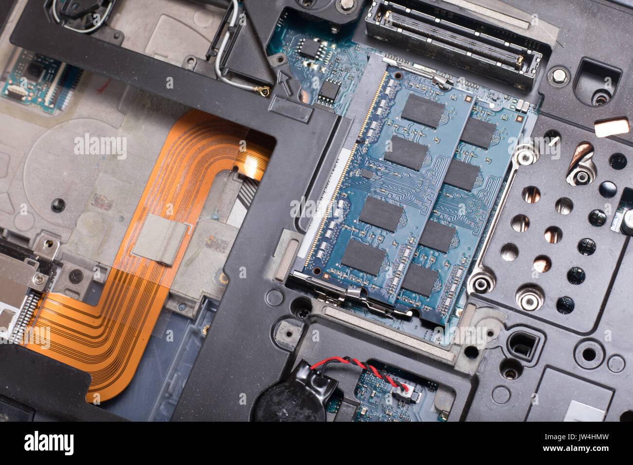 A close up of the internal wiring parts and electrical components of a