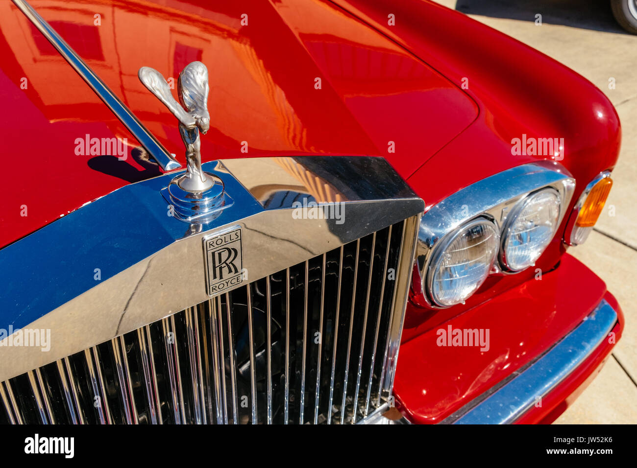 Front of Rolls Royce car showing the distinctive hood ornament, Spirit of Ecstasy. Stock Photo