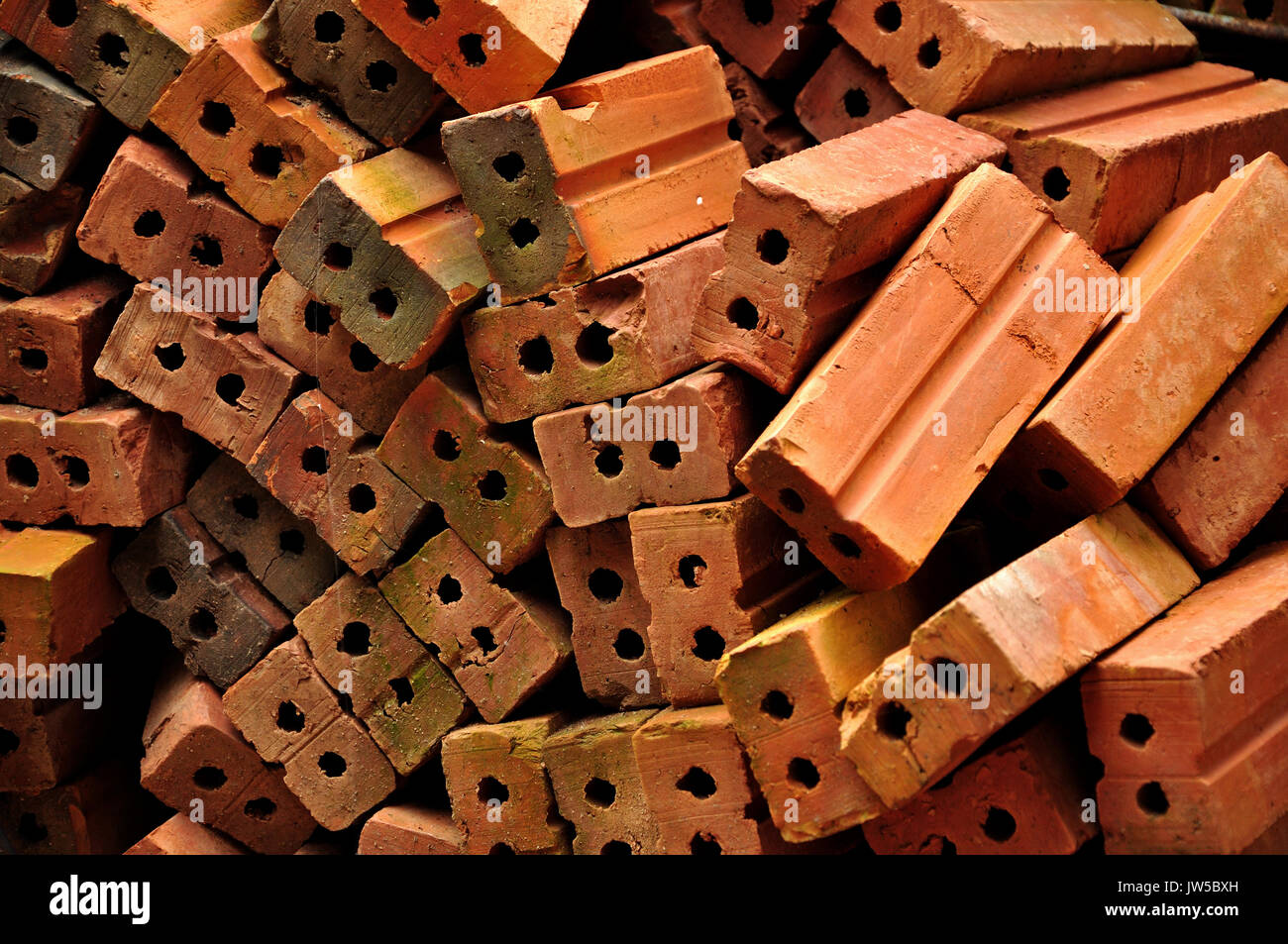 A brick is a block of ceramic material used in masonry construction