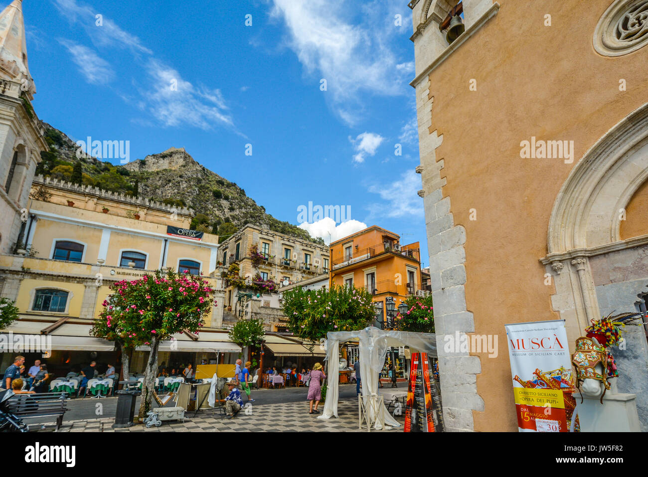 View of the mountains overlooking Taormina Italy from the main street in town, Corso Umberto Stock Photo