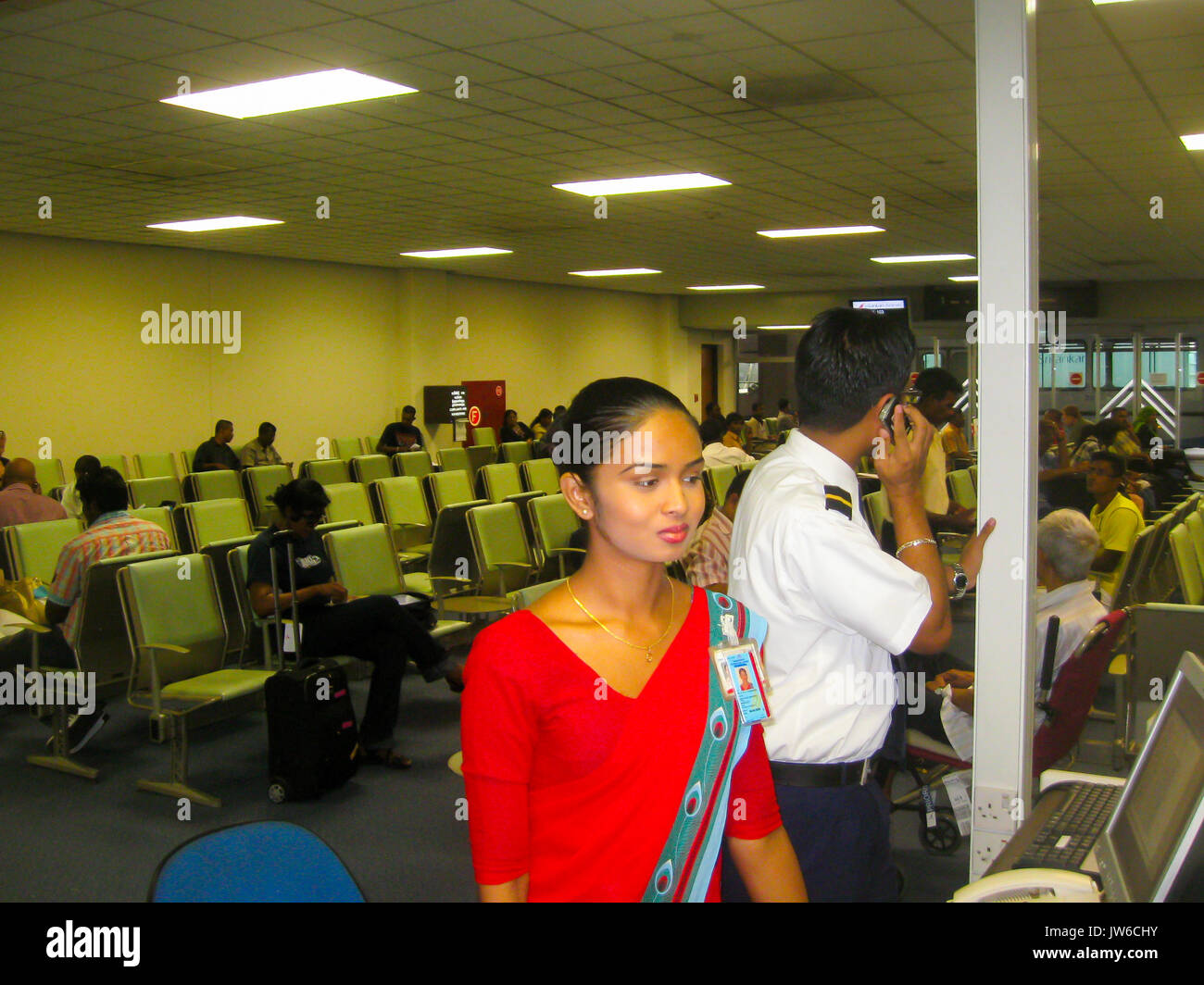Colombo, Sri Lanka - May 05, 2009: The Young beautiful flight attendant in the Transit area at Bandaranaike International Airport. Stock Photo