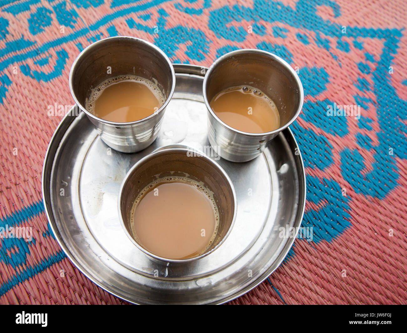 Tea served in aluminun cups kumaoni style at the remote Kot Kendri village, Kumaon Hills, Uttarakhand, India Stock Photo