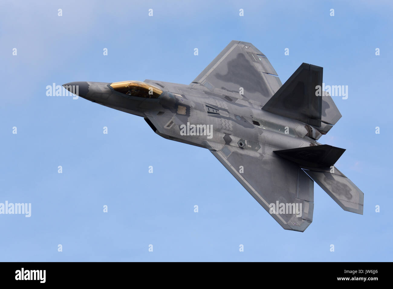Lockheed Martin F-22 Raptor stealth fighter jet plane flying at an airshow. US Air Force. Space for copy Stock Photo