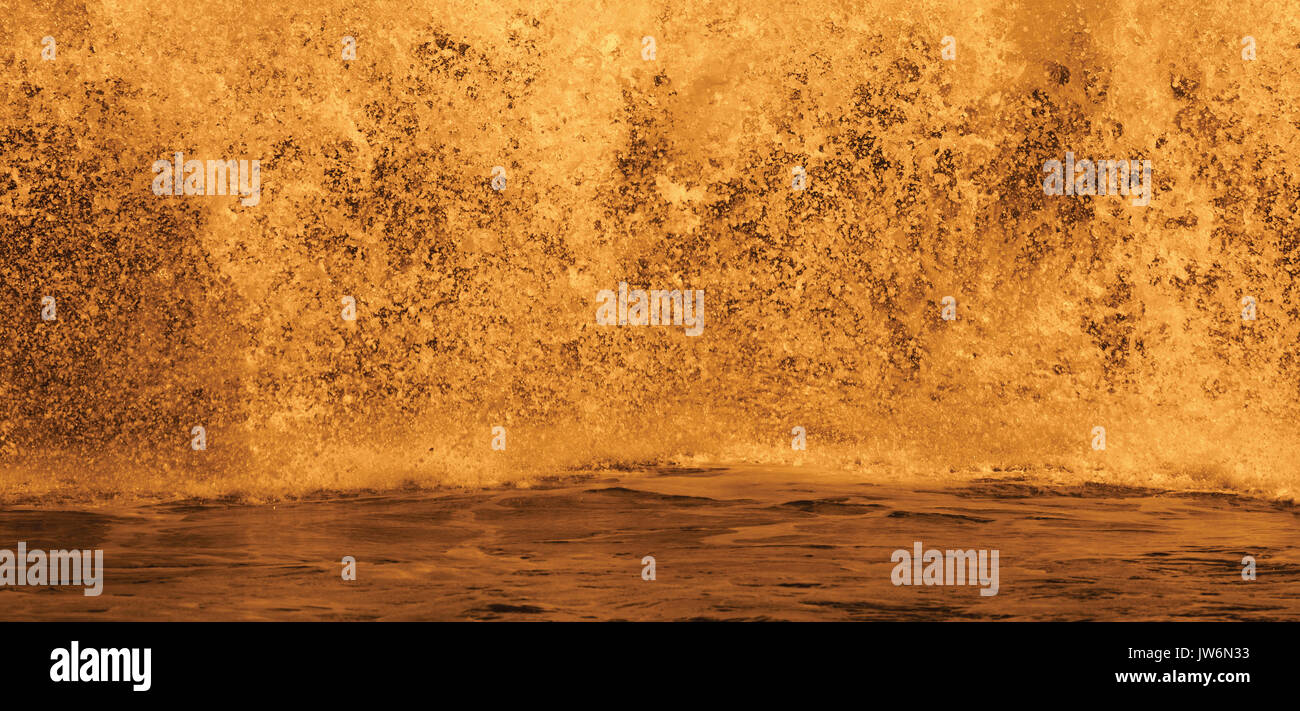 Breaking wave abstracted in post-processing. Stock Photo