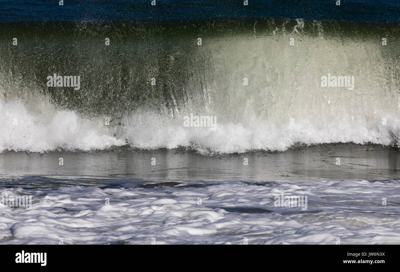 Breaking wave abstracted in post-processing. Stock Photo