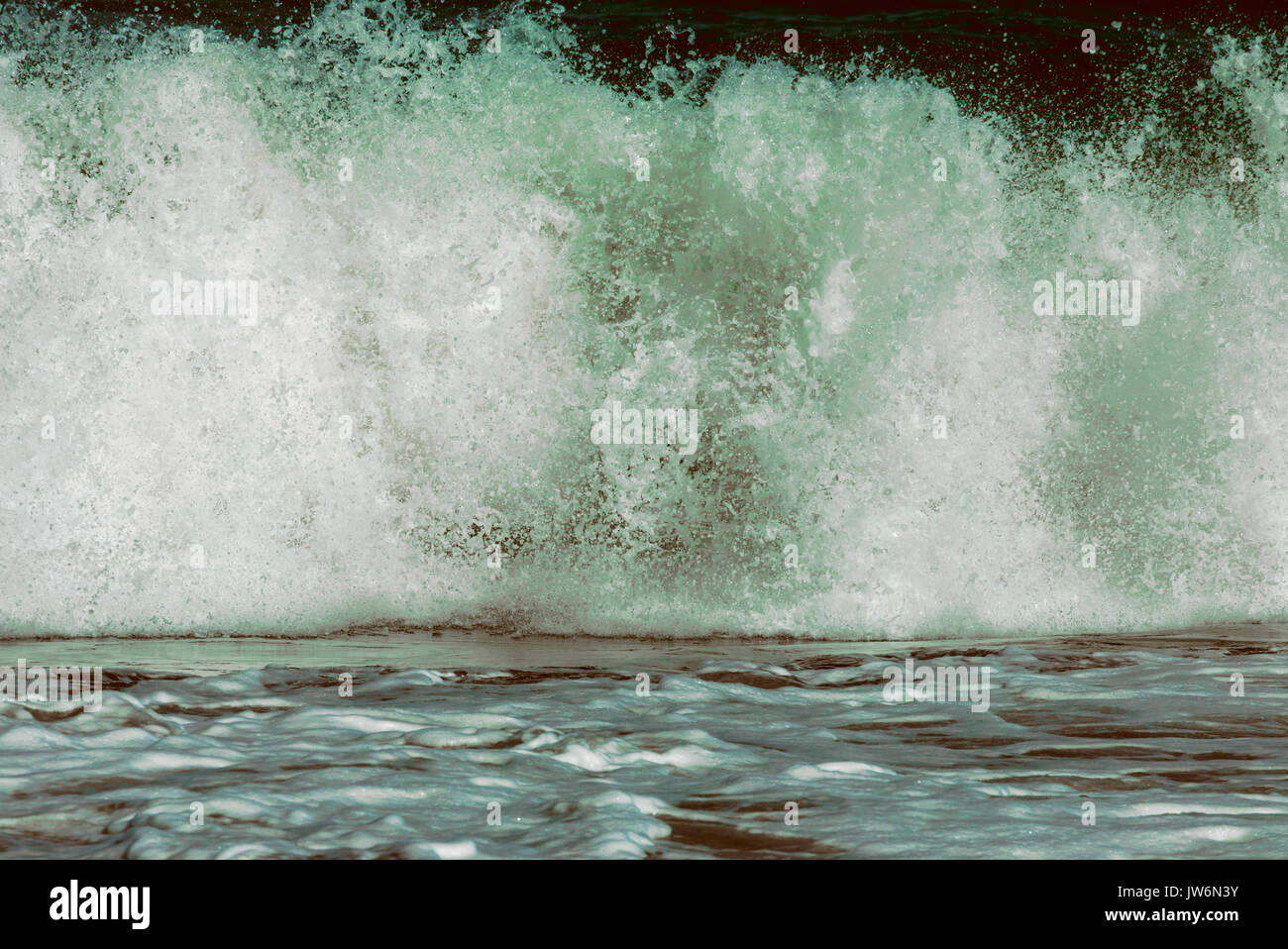 Breaking wave abstracted in post-processing. Stock Photo
