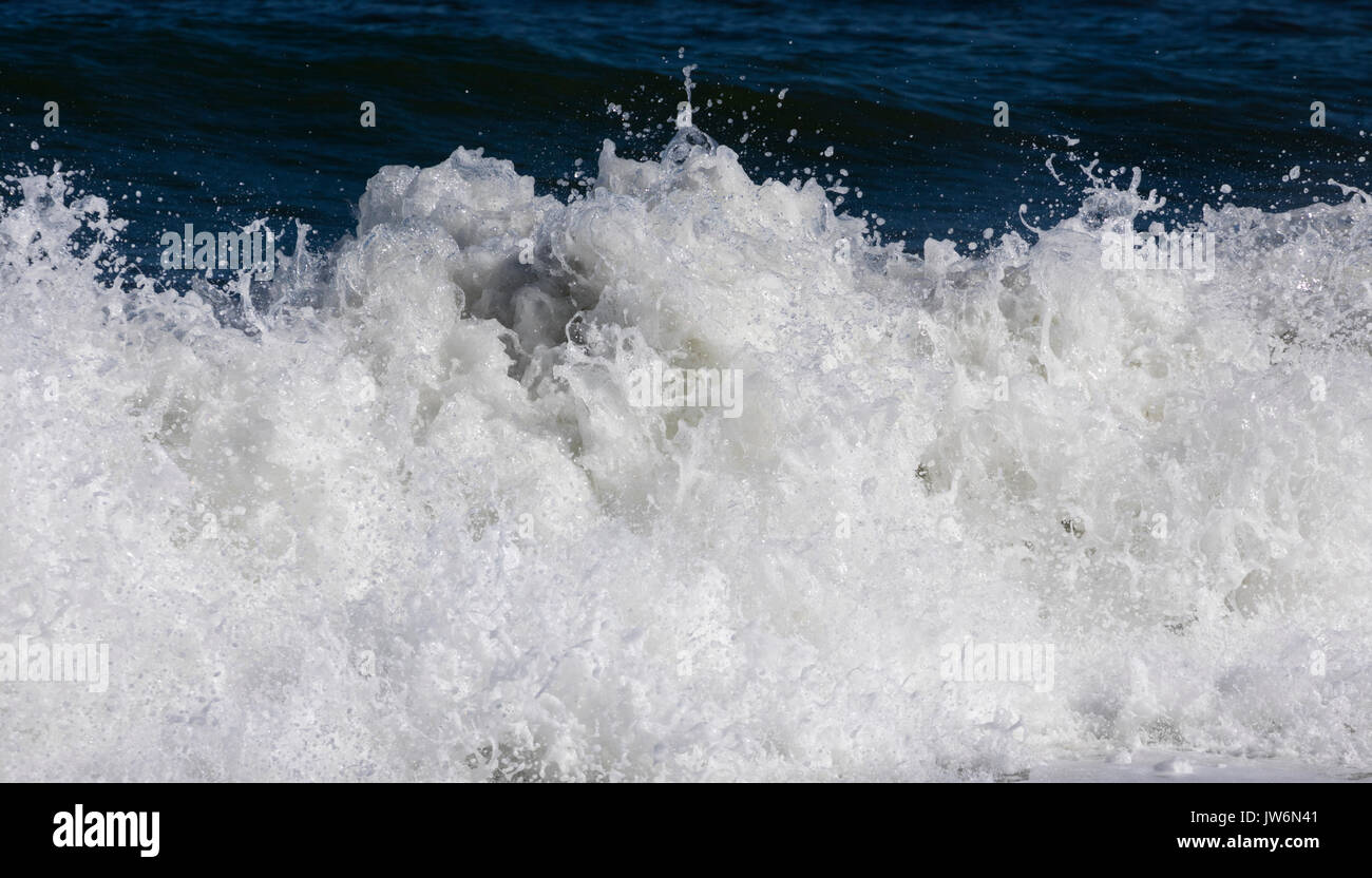 Breaking wave abstracted in post-processing. Stock Photo