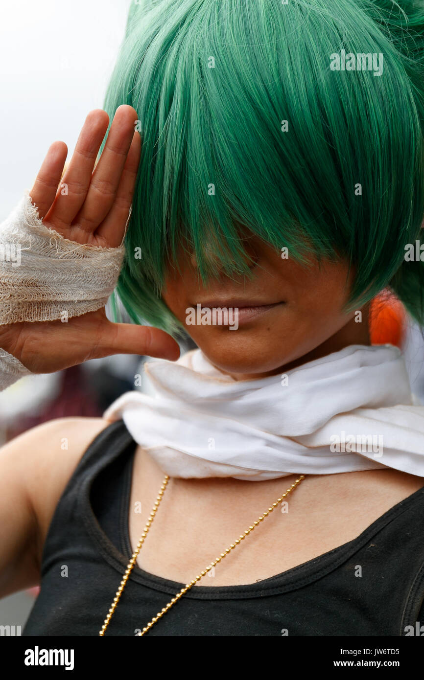 Tokyo, Japan. 11th August, 2017. A cosplayer poses for a photograph ...