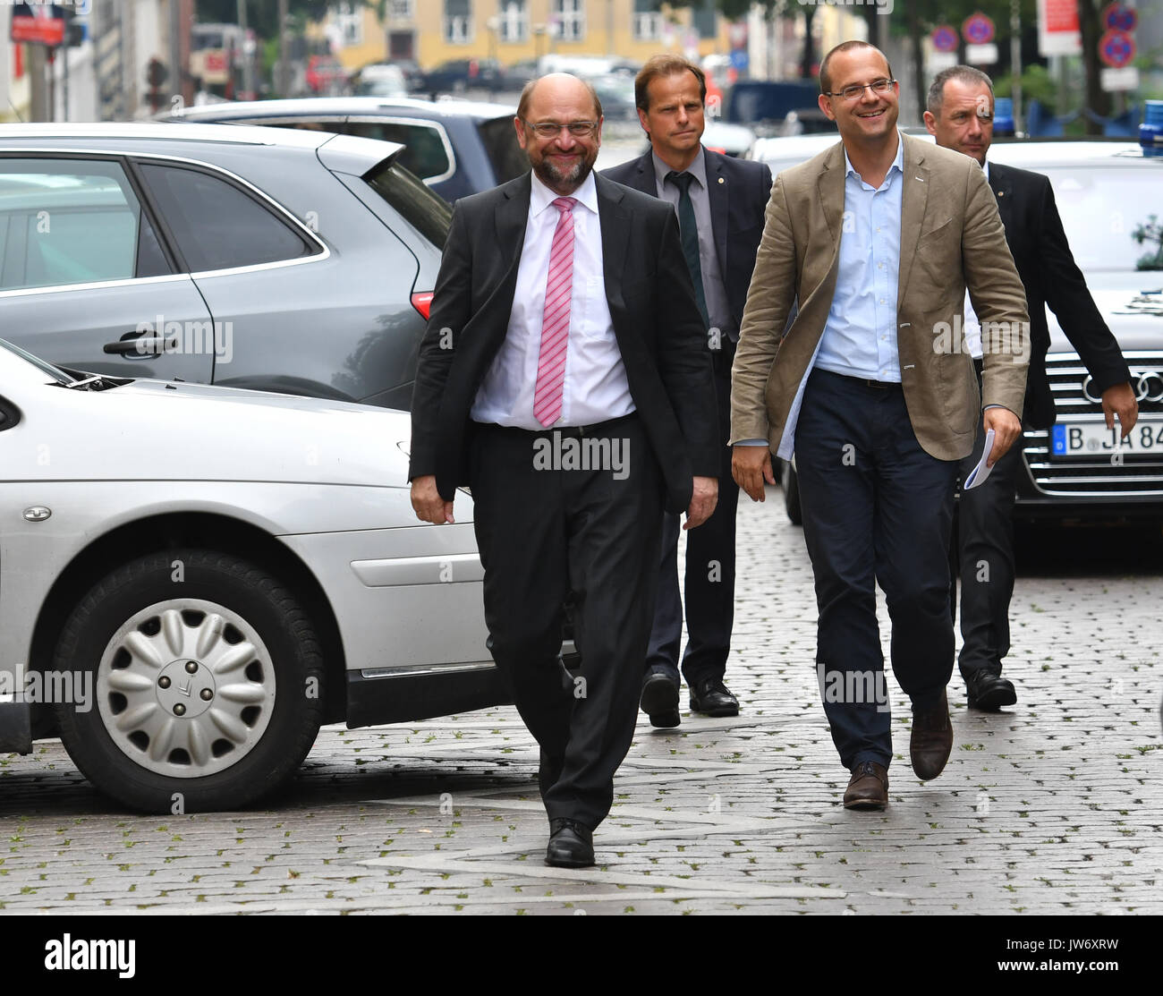 Berlin, Germany. 11th Aug, 2017. The SPD's candidate for Chancellor, Martin Schulz, arrives to press conference regarding the German automotive industry in Berlin, Germany, 11 August 2017. The SPD called for an EU quota for electric autos during the debate regarding diesel emissions and looming auto bans. Photo: Paul Zinken/dpa/Alamy Live News Stock Photo